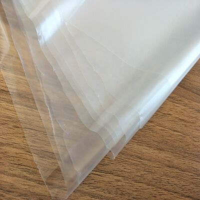 Film TPU Super Tipis Lembut Tahan Air 0.015mm Lembaran Plastik Poliuretan untuk Jas Hujan dan Kasur Medis